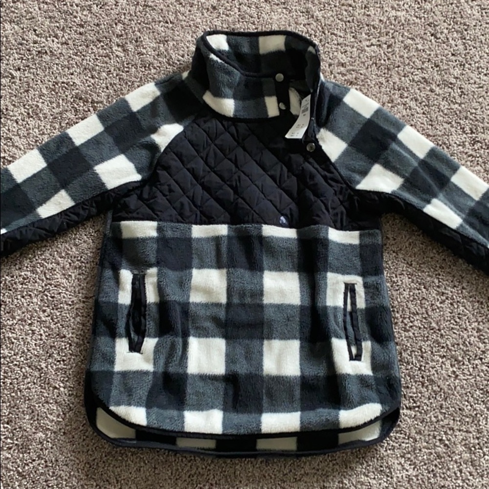 Asymmetrical snap up fleece
